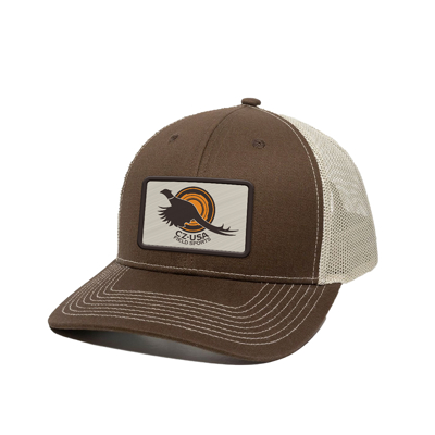 A trucker hat with a gray front and white, open-ended back. The front shows the CZ-USA original design, a flying pheasant with an orange multi-layered circle behind it.