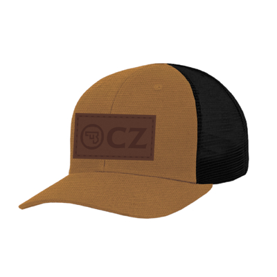Image of the front of a brown and black CZ lifestyle trucker hat with a CZ logo patch in brown